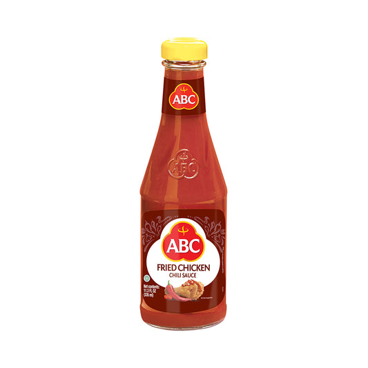 ABC Fried Chicken pictured in a glass bottle with an image of flour coated fried chicken drizzled with chili sauce.