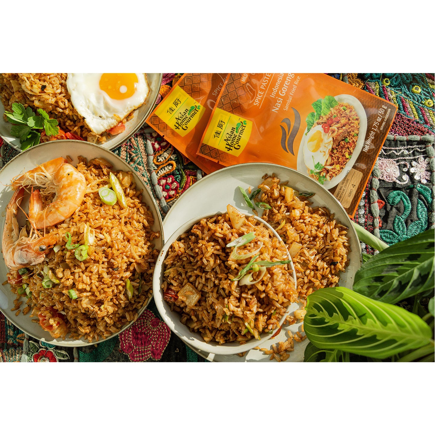 Lifestyle photograph of Indonesian style fried rice in bowls.
