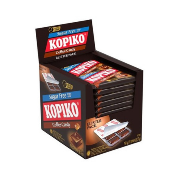 A display box of Kopiko Sugar Free Blisters coffee candy. There are stacks of Blisters candy inside the display box. It features a picture of a piece of candy with a drip of coffee from the coffee bean on top of it. A red Kopiko Logo in white font is shown everywhere in the box.